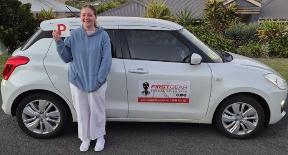 Jorja Davis celebrating passing their driving test